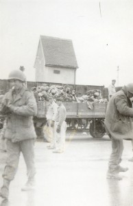US soldiers liberating a death camp1 U.S. soldiers liberating a death camp. From the H. G. Clark Scrapbook.