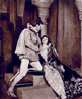 Viola Allen and Benjamin Howard acting out a passionate scene from In the Palace of the King.