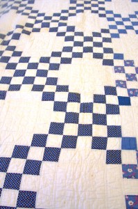 Blue and white double Irish chain patterned quilt with blue trim that was quilted by a member of the Prather-Hardin families. From The Filson Historical Society’s Museum collection. 2013.20.2