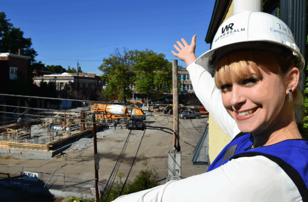 Filson staff member, Laura Kerr Wiley showing off the Filson Expansion Project, 2014, The Filson Historical Society 
